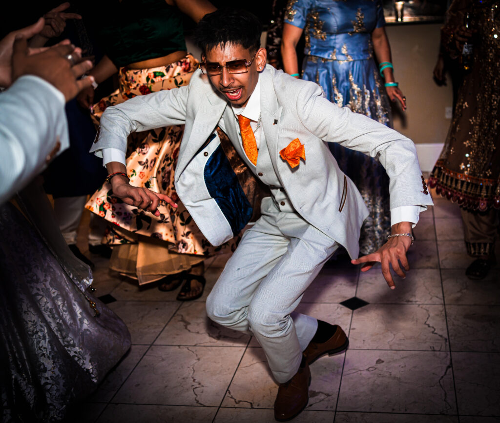Wedding day dance floor chaos at a Bollywood style wedding